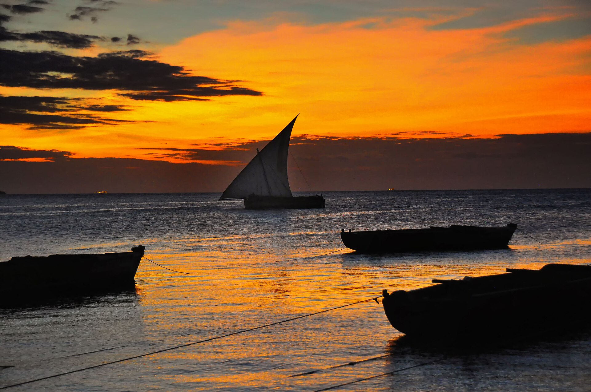 Lateen dhow at sunset on the Zanzibar coast