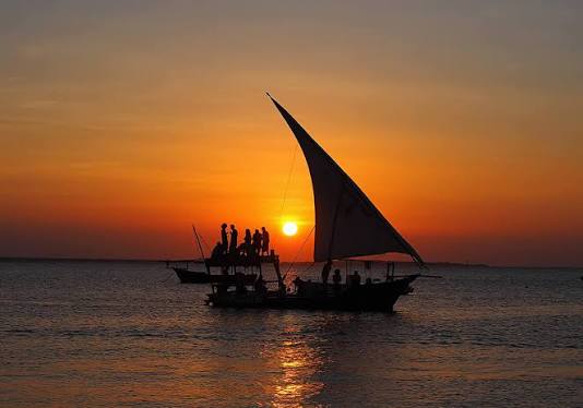 Dhow under sail at dusk